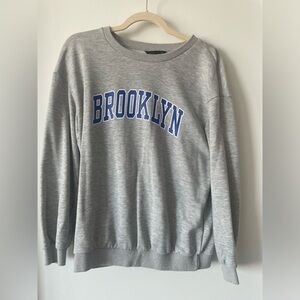 grey graphic sweater